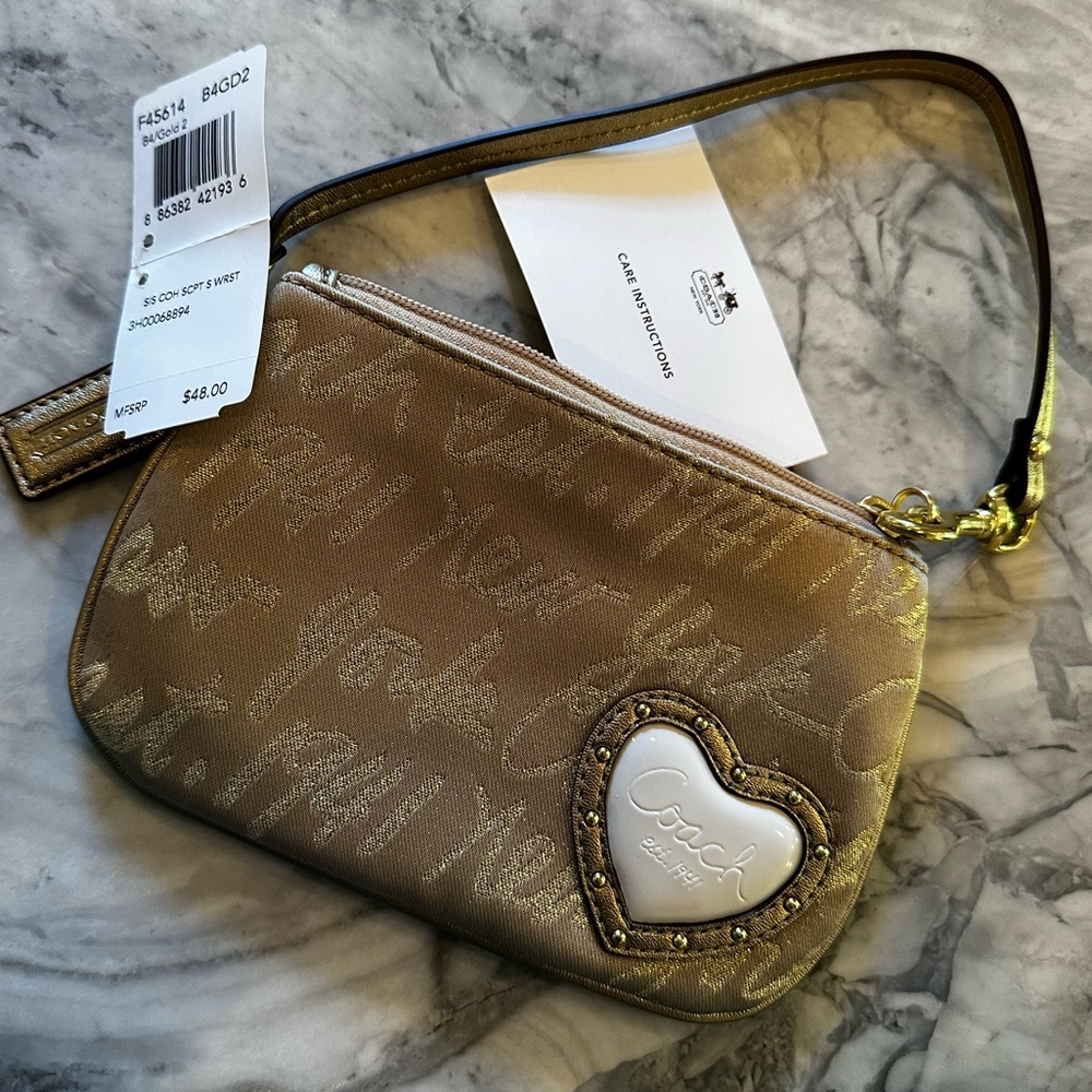 NWT Sweet Coach Wristlet with Raised Heart